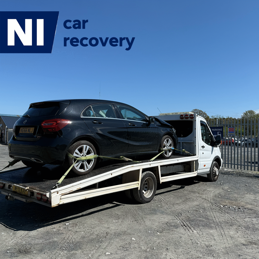 Vehicle breakdown recovery in Moira with car loaded onto recovery lorry